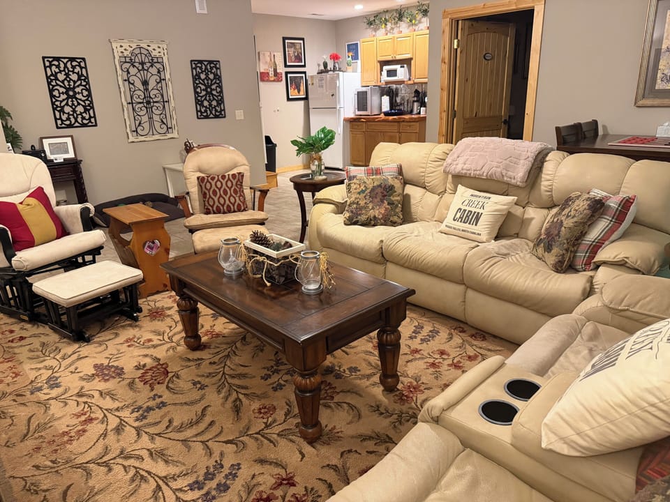 Lower level living room,electric recliners & fireplace,TV, bar,fridge,microwave,