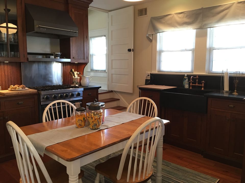 Eat in kitchen with Viking gas range and oven, Sub Zero refrigerator

