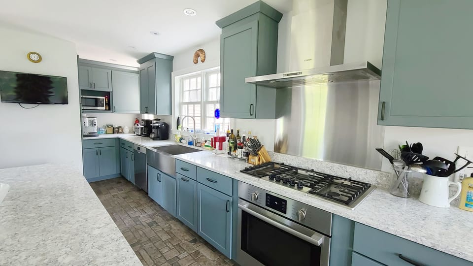 Nicely equipped kitchen with stainless appliances