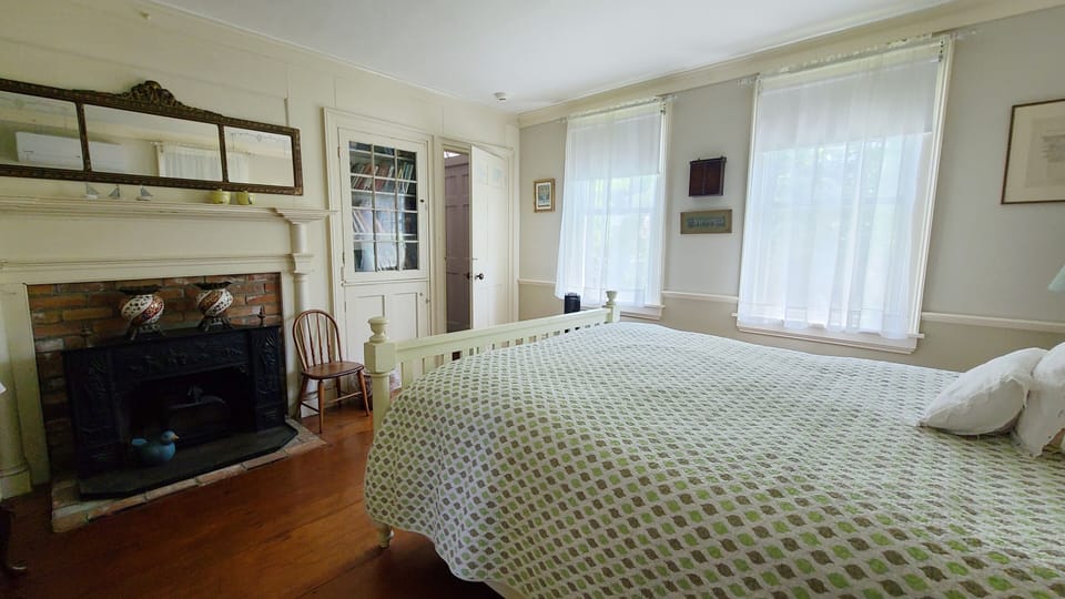 First floor bedroom with queen bed