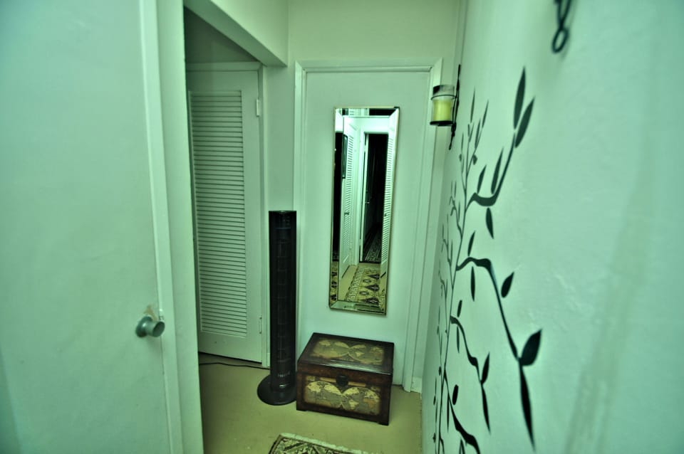 hallway outside of bedroom and bathroom