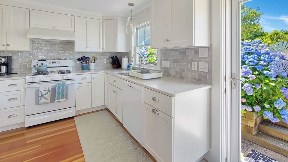 Fully renovated kitchen with quartz counter tops
