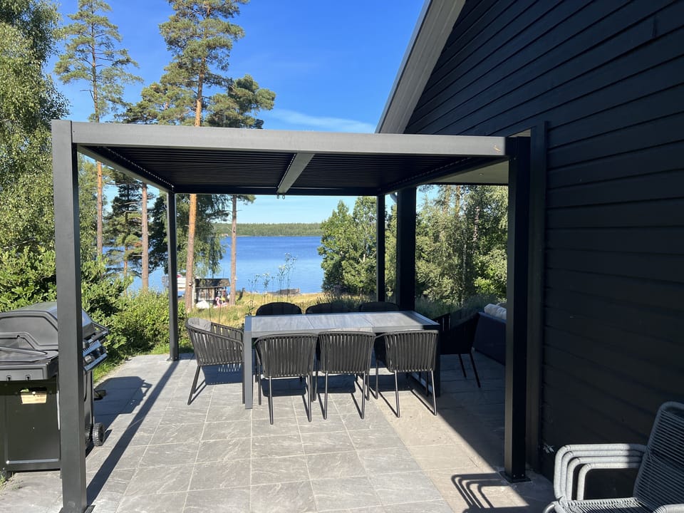 One of many outdoor eating areas with BBQ.