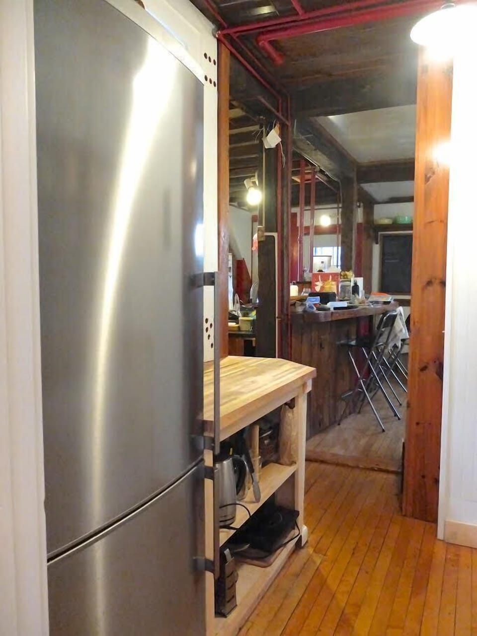 prep kitchen into dining room / main kitchen area. Fridge #1