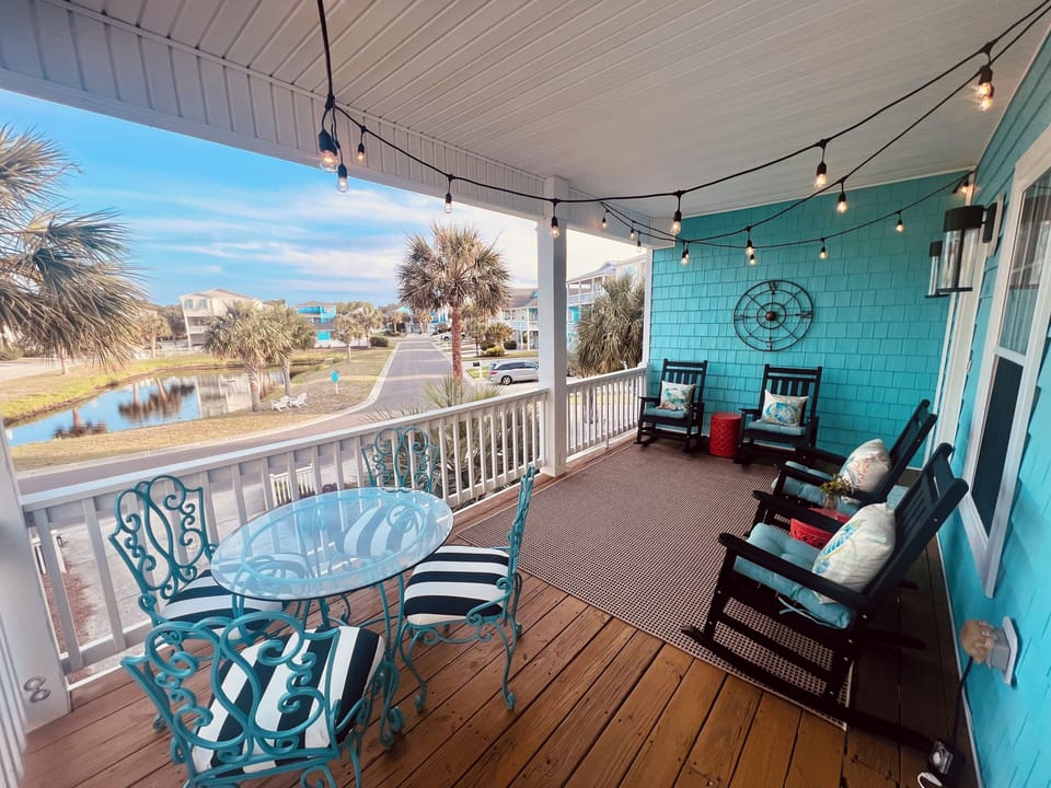 Rock on the front porch with coffee and under the market lights at night.
