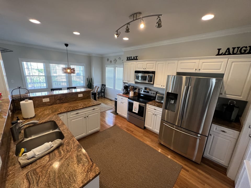 Room for everyone to help in the modern, functional kitchen. 