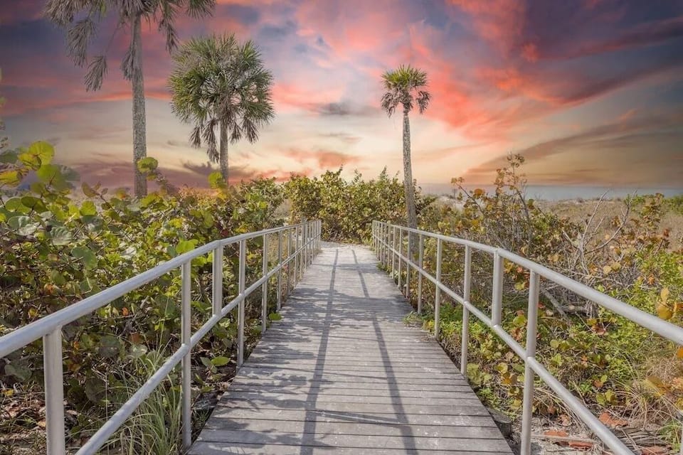 Cross the street to boardwalk path to the beach