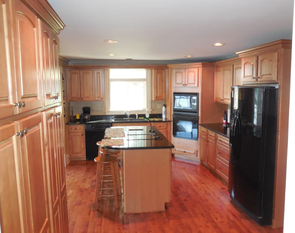 Kitchen with granite countertops and all appliances and cabinets