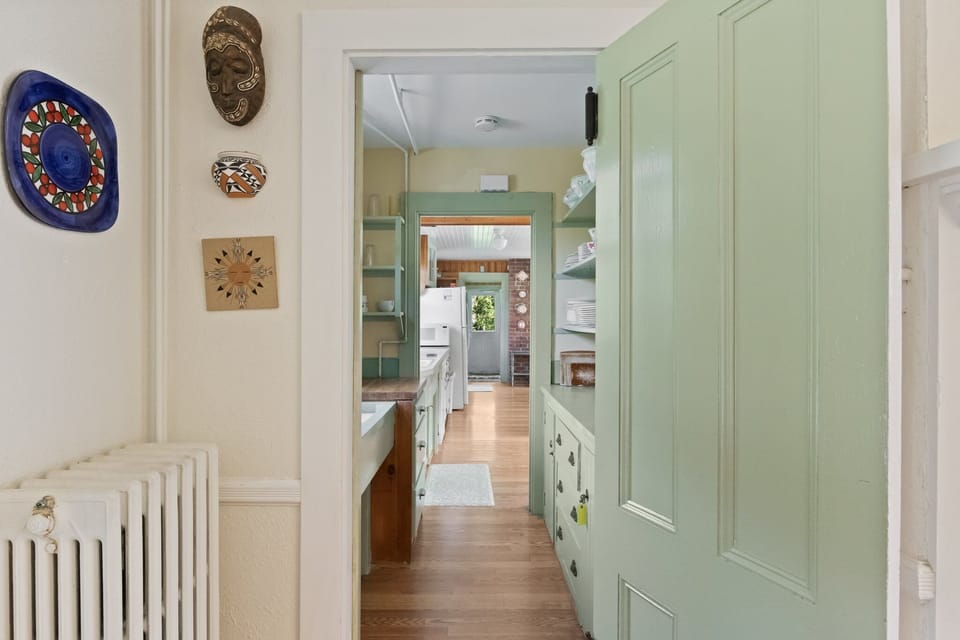 Butler's pantry between dining room and kitchen