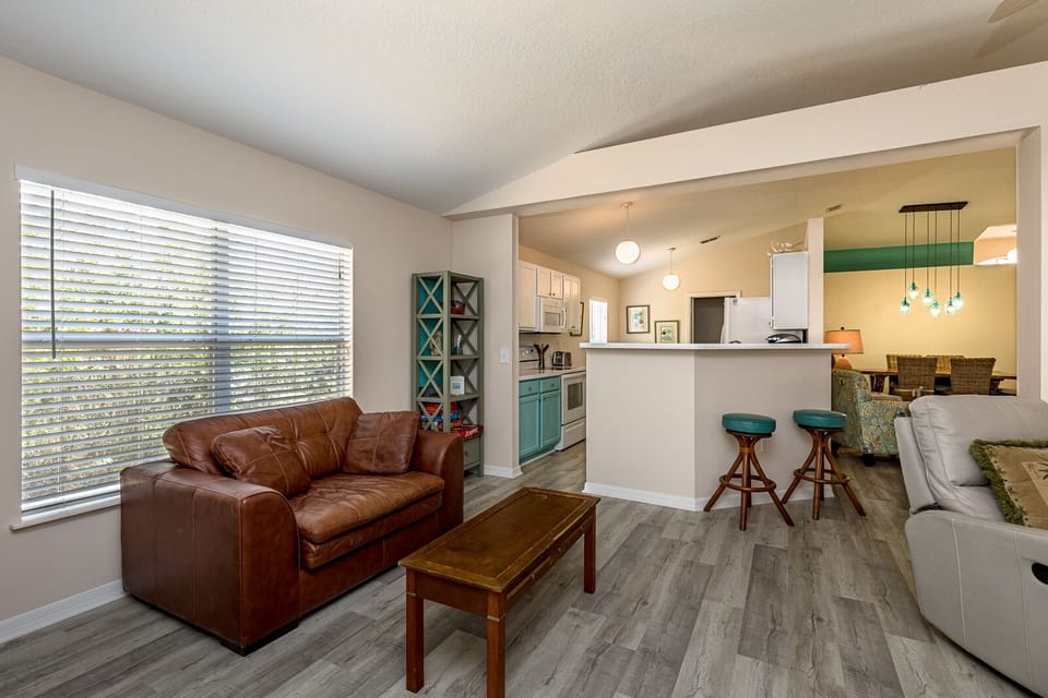 3rd Living BOOK NOOK area with recliners, game table, and reading materials