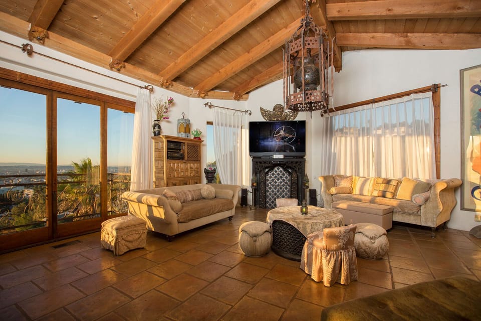 Living room with cathedral ceilings.
