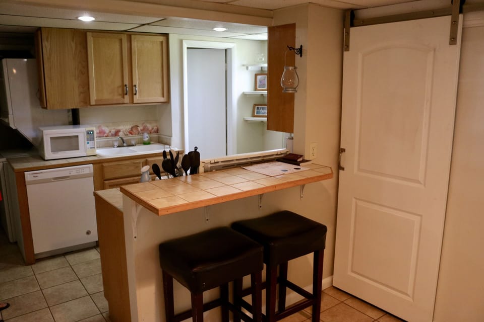 Standard height bar. sliding barn door to closet.