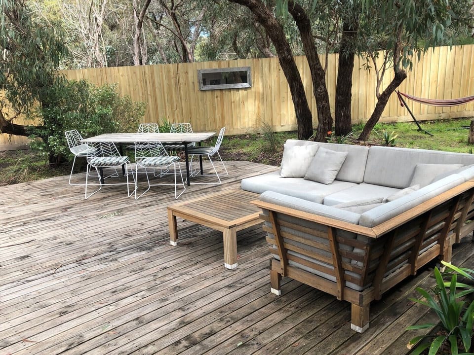 Outdoor lounge and setting (hammock in background).