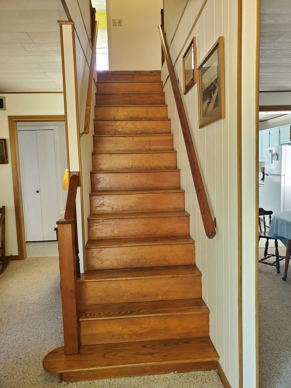 Stairs to bedrooms and upstairs bathroom
