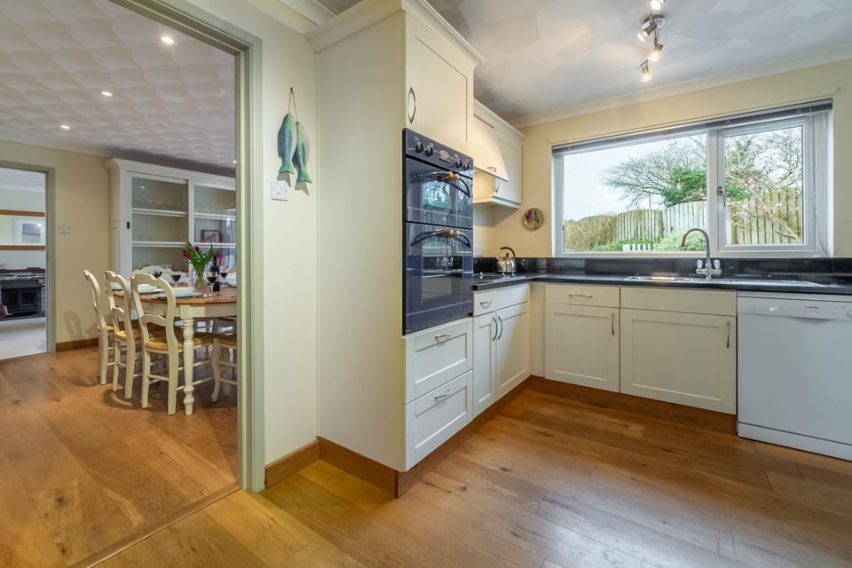 Burlorne, St Minver. Ground floor:  Kitchen leading through to dining room