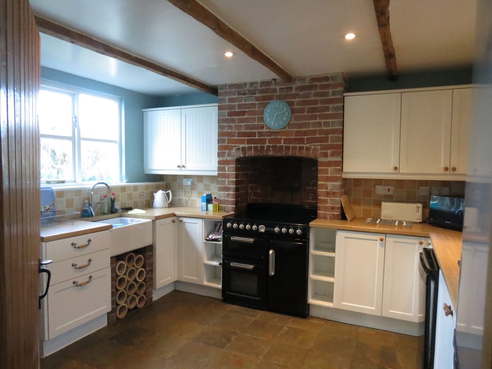 Kitchen with large electric cooking range