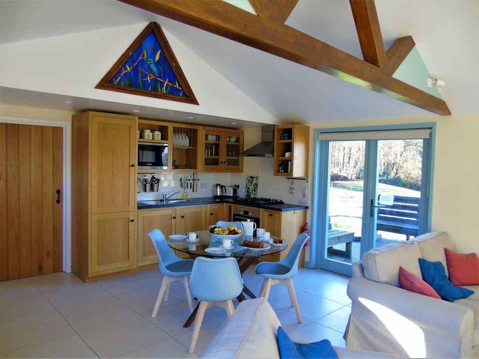 Glass table with kitchen area 
