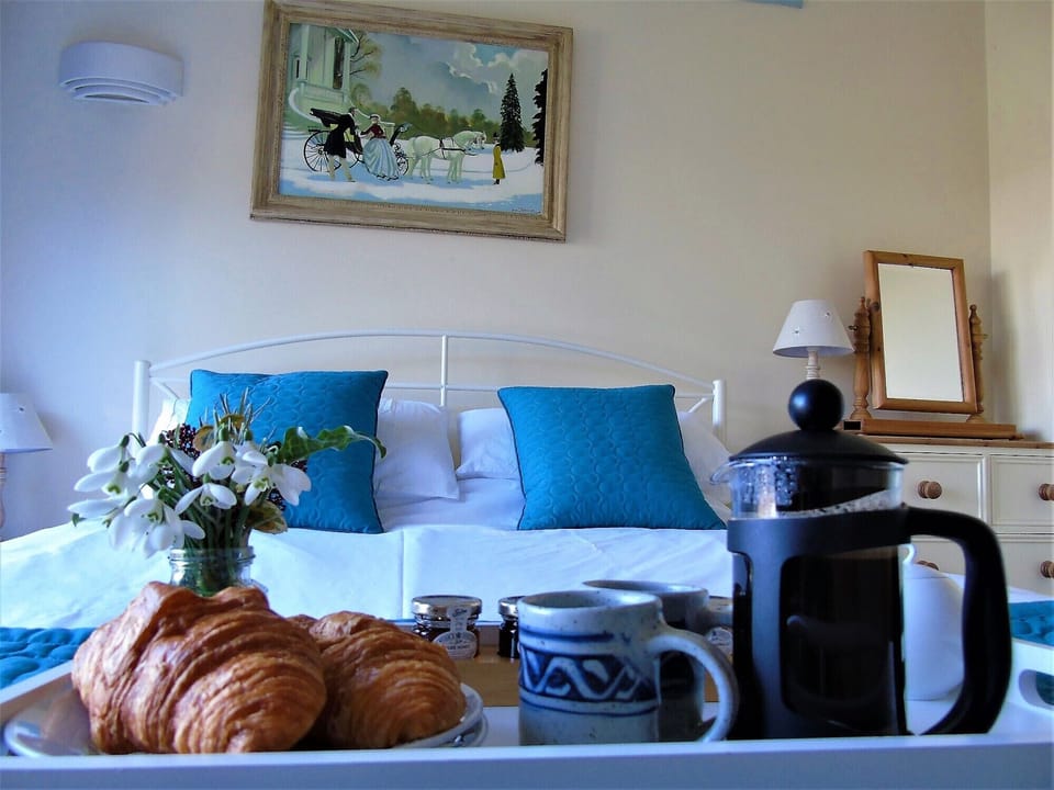 Bedroom 1, croissants and coffee