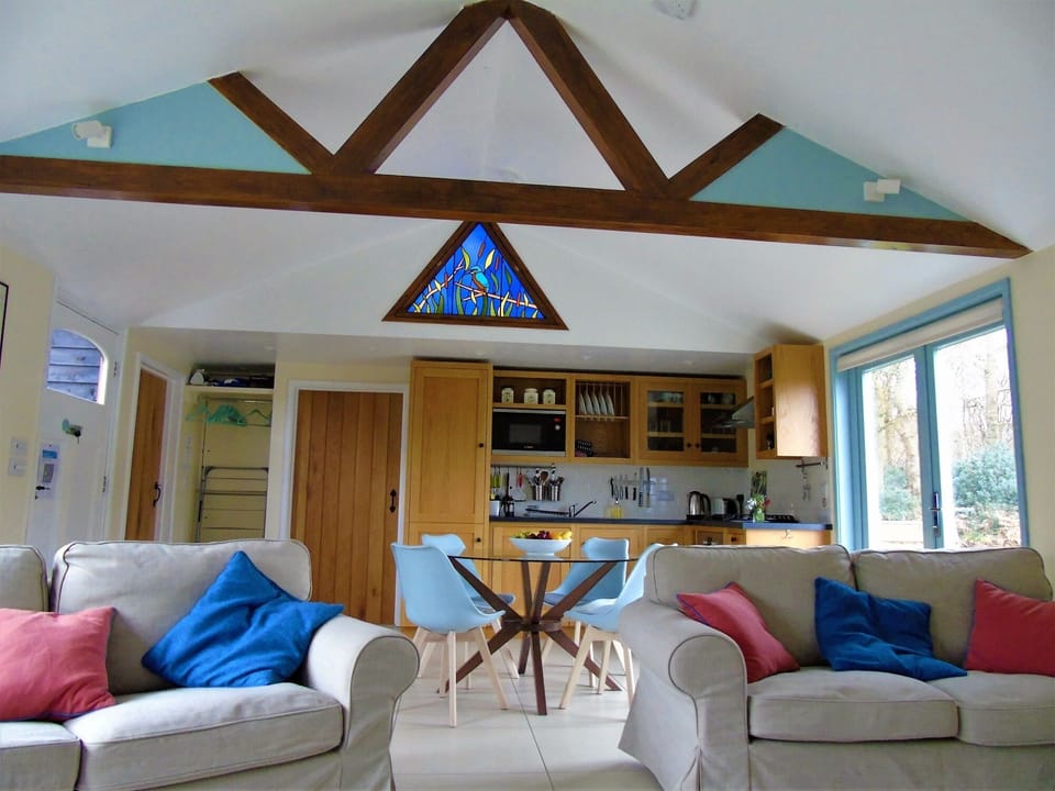 Sitting room area looking at Kitchen and french doors