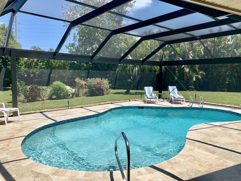 Pool area overlooking private garden