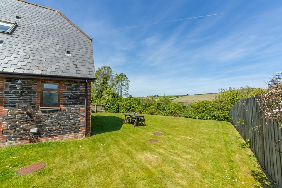 September Cottage, Roserrow. Enclosed garden and charcoal barbecue, ideal for enjoying those famous Cornish sunsets