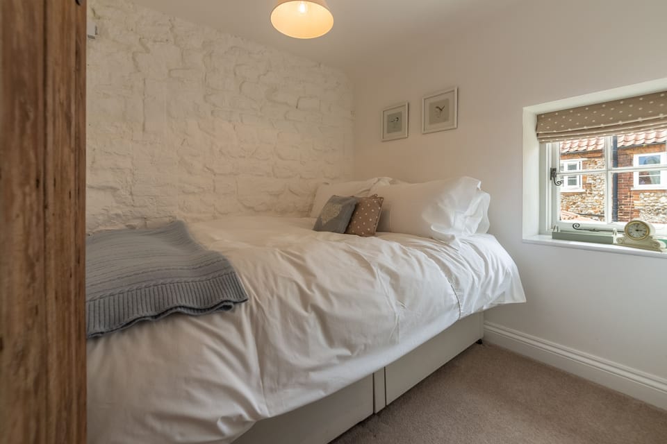 First floor: Bedroom two features a small double bed