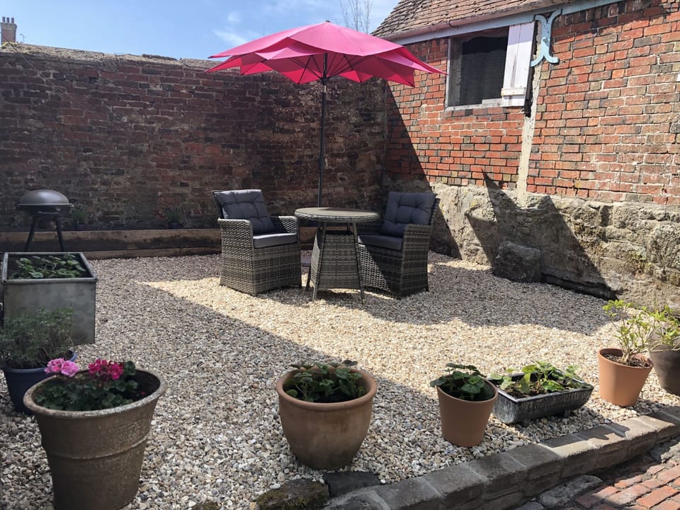 Private walled terrace to the back of the property