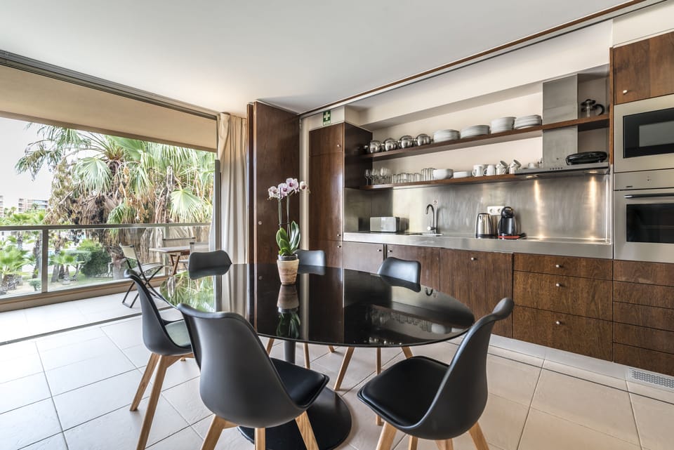 Kitchenette leading to the balcony.