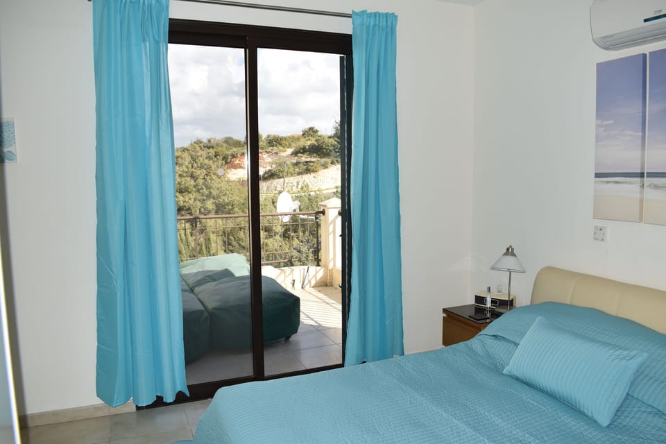 upstairs master bedroom with veranda