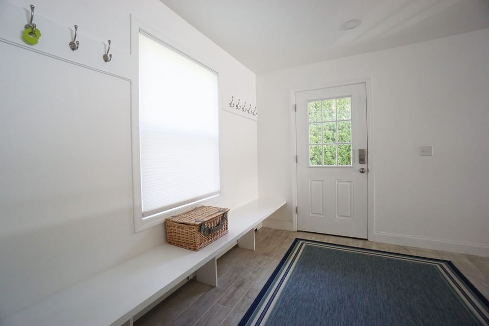 Mudroom entrance with picnic basket for Tanglewood.