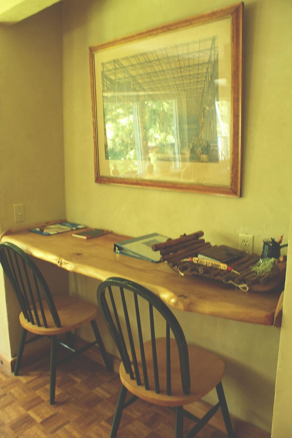 Raw edge work desk in dining room.