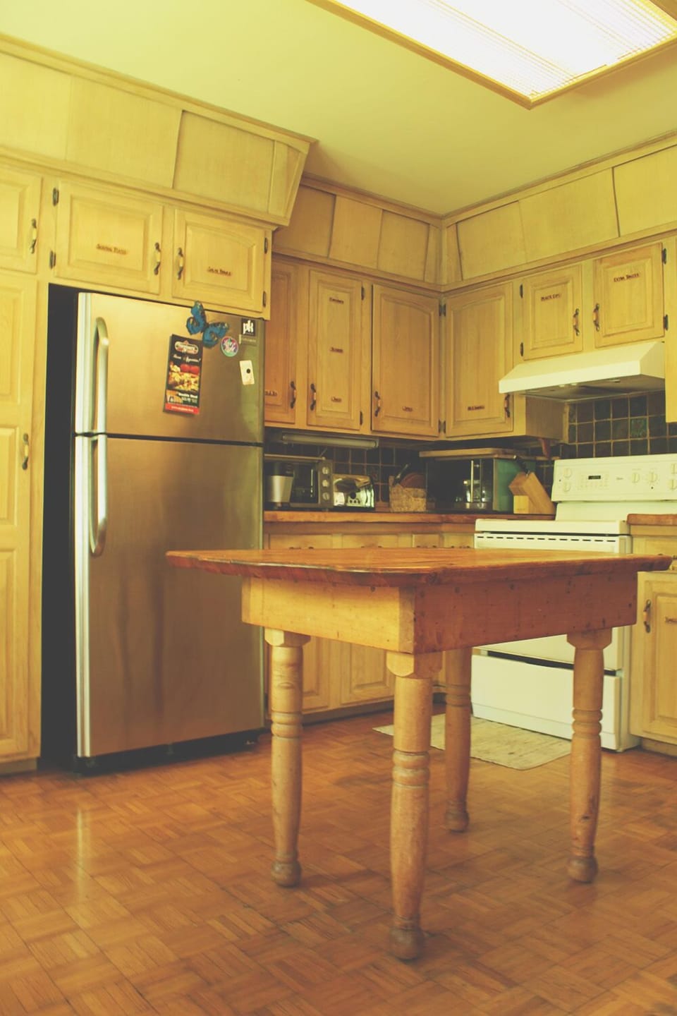 Bright and complete kitchen overlooking the river.