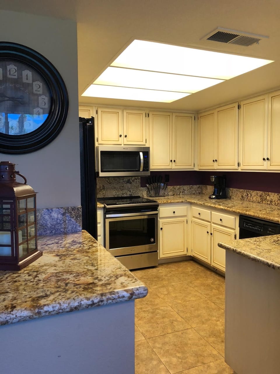 well-stocked kitchen with new stove, dishwasher & microwave in 2019