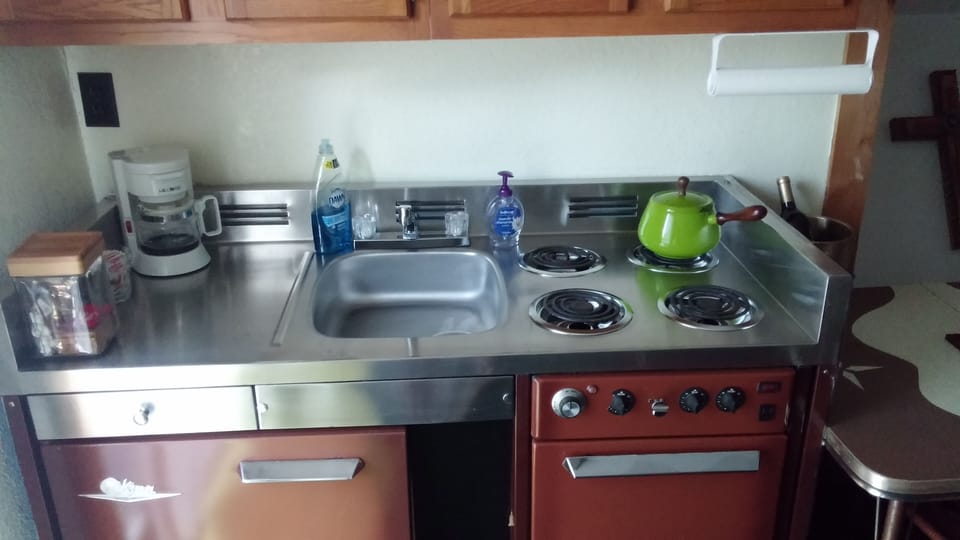 Working stove and oven.  Gas grill located on private deck outside.