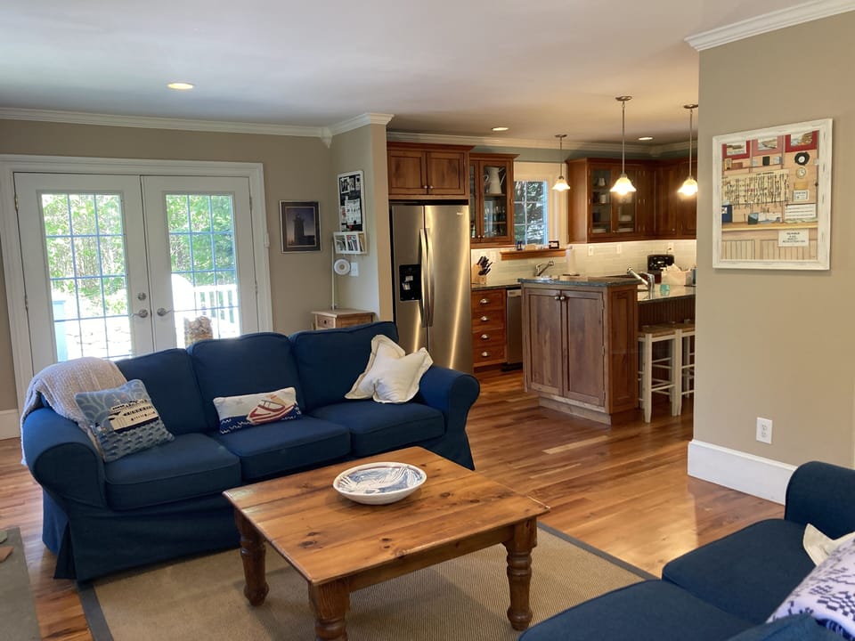 Warm cherry floors and cherry kitchen cabinetry
