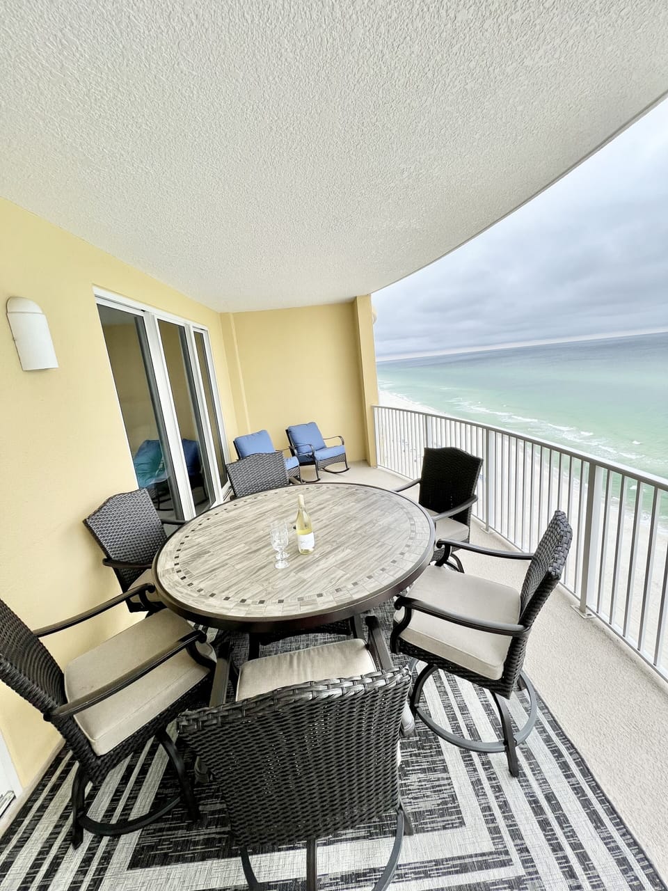 Large balcony with table that seats 6 with balcony height chairs