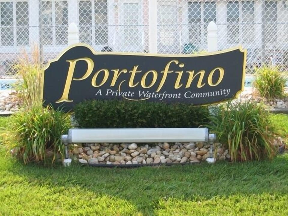 Entrance to community--pool behind the sign