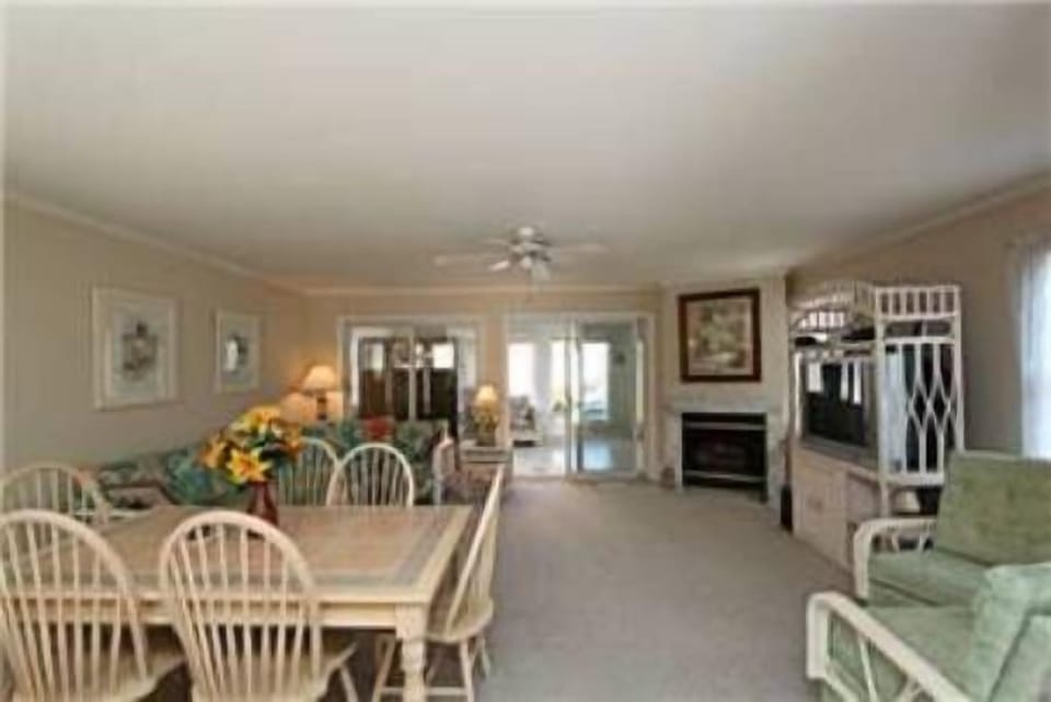 View from Kitchen thru Dining Rm to Living Rm w/fireplace and TV, lots of room