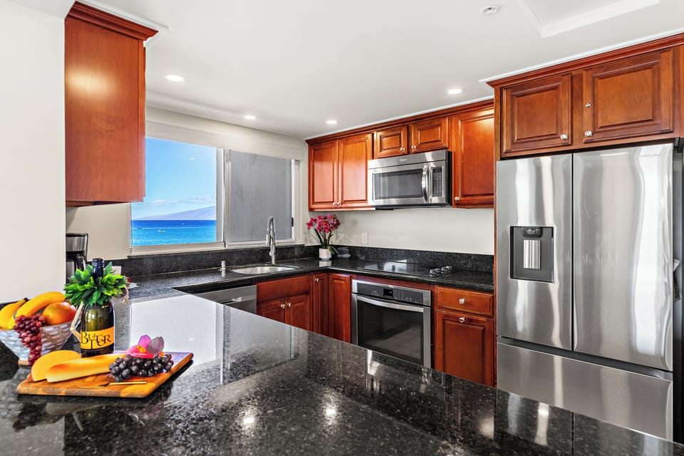 Fully equipped kitchen with expansive countertop to prepare your meals