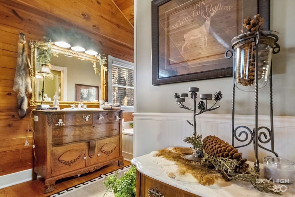 Close up of of decor featuring woodland and whitetail deer accents.
