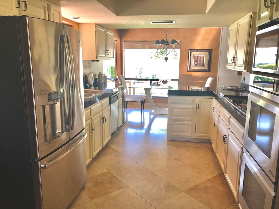 Stainless appliances..A formal dining &  separate breakfast lunch dining area 