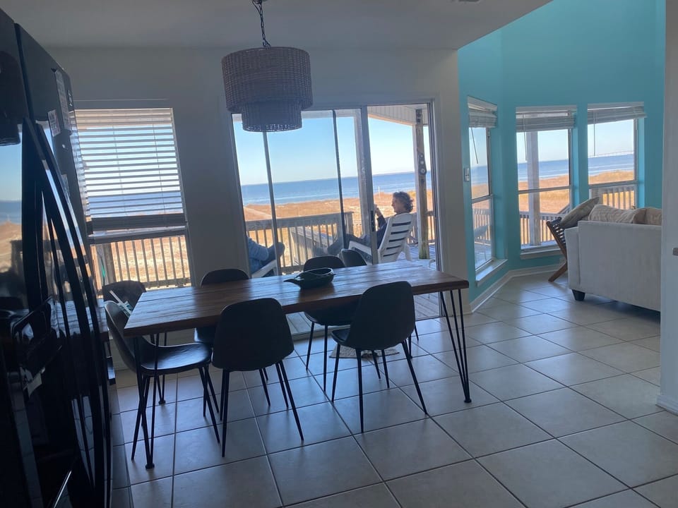 Relax with your morning coffee on your private deck outside the kitchen 