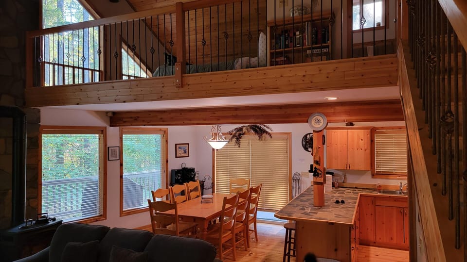 Dining, kitchen and loft view