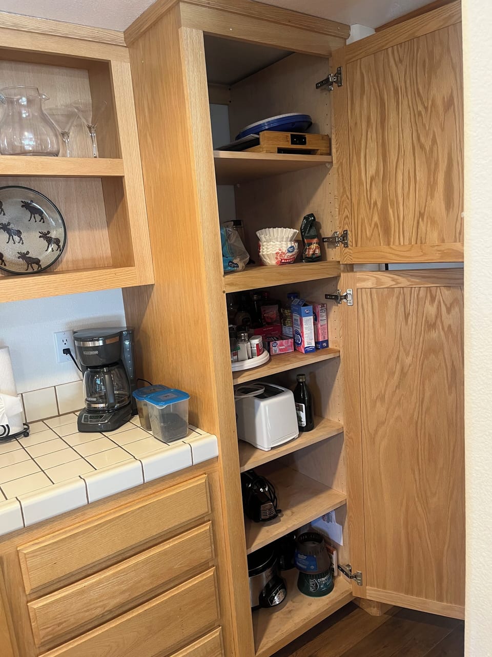 Pantry with toaster, juicer, crock pot, blender, and mixer
