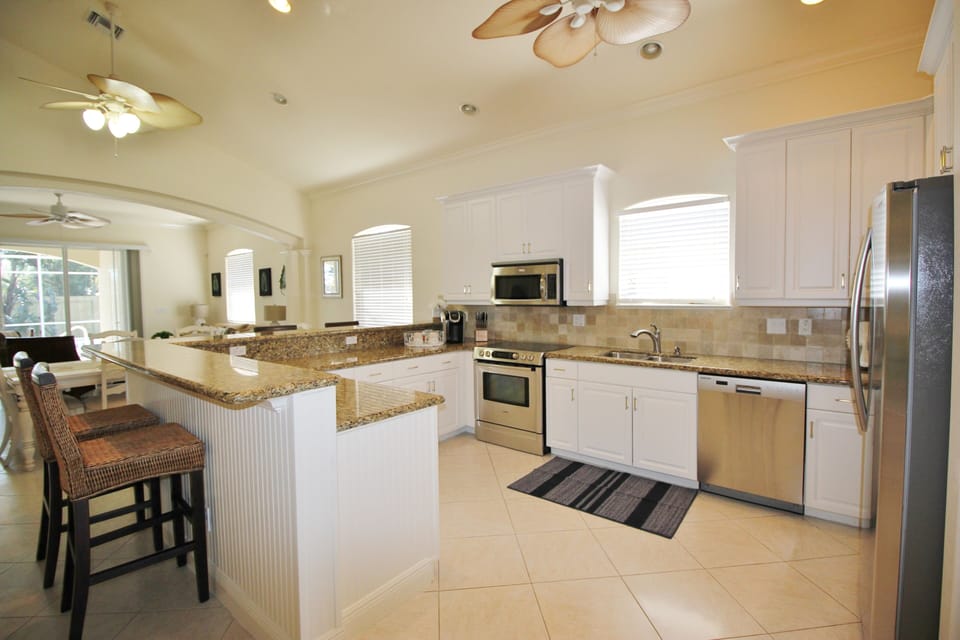 Large open kitchen is fully stocked for cooking!  