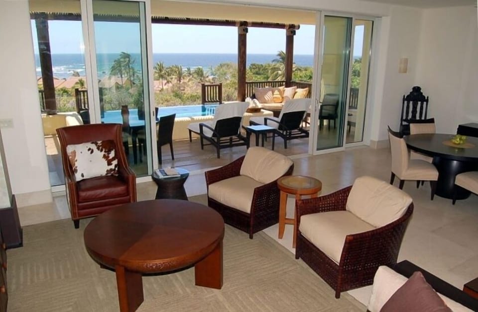 Living Room and Lanai with Infinity plunge pool (2 bdr.)