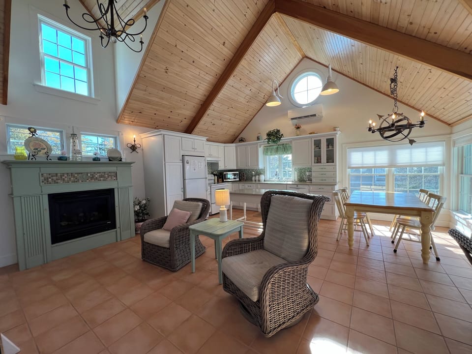 Open living/ kitchen/ dining area.