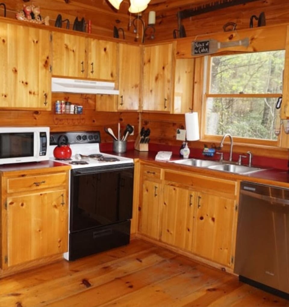 Everything you need to prepare a meal!  Pots, pans, utensils, and dishes. 