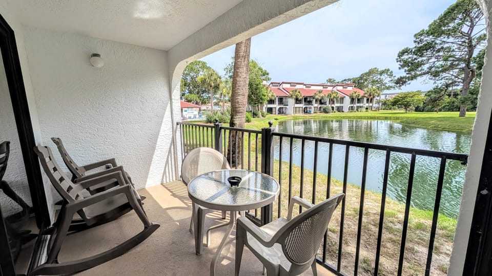 Patio overlooking pond just steps from Pool