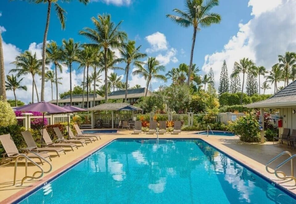 Pristine swimming pool, large hot tub (back right) and kiddie pool (back left)